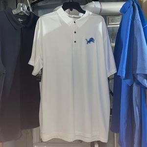 NEW men’s Lions polo